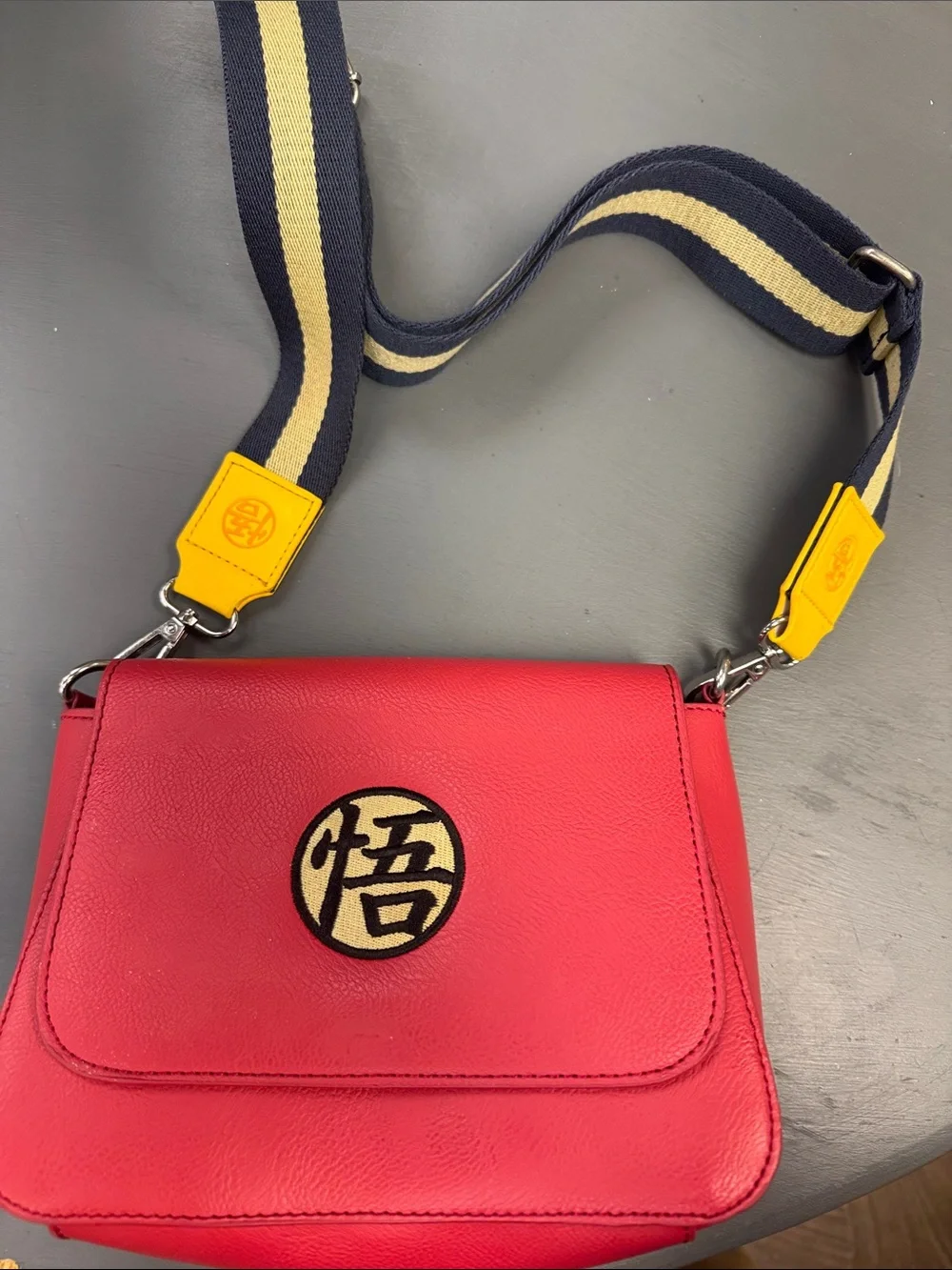 Loungefly Red Dragon Ball Z Crossbody Bag with Navy & Yellow Strap